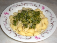 Gomiti rigati light con zucchine e piselli in umido